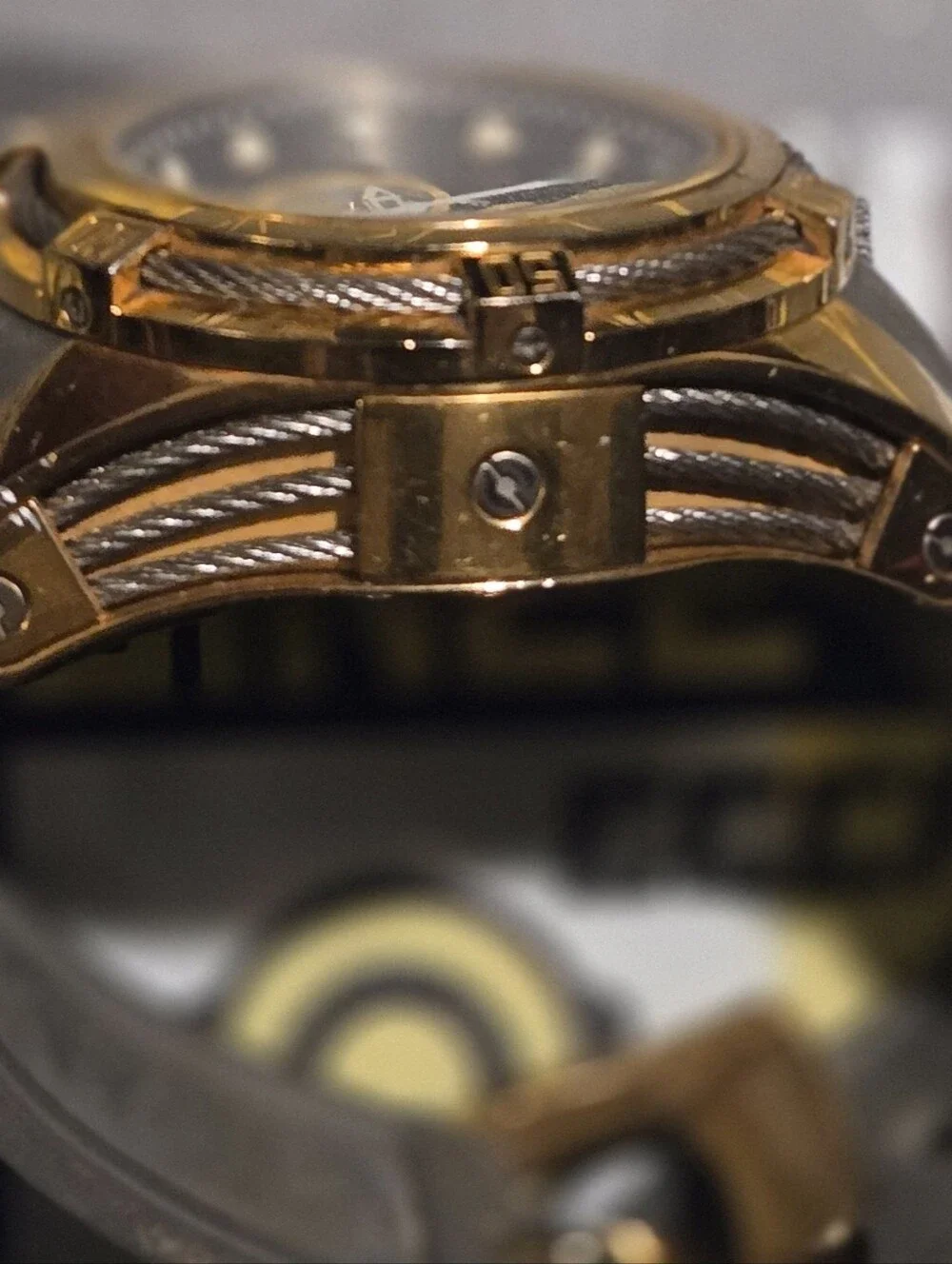Invicta Gold and Black Chronograph Watch with Gray Strap